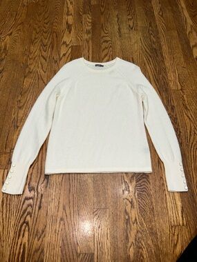 Ivory Cashmere Crewneck Sweater with Button-Cuff Detail. Minimalist Fashion